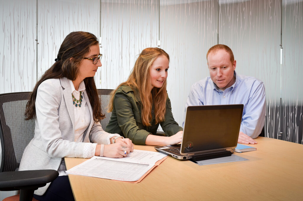 Interns at desk